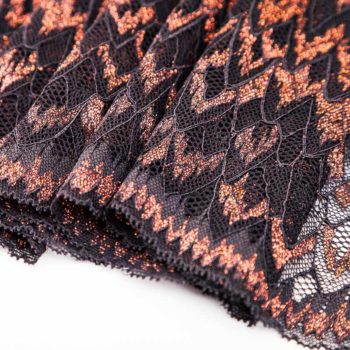 elastische Spitze in schwarz mit kupfer glitter