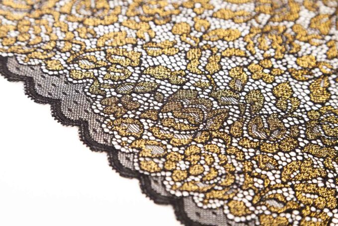 elastische schwarze Spitze mit glänzenden Lurexfäden in gold zum nähen von BHs, Slips, Panties, Strings etc.